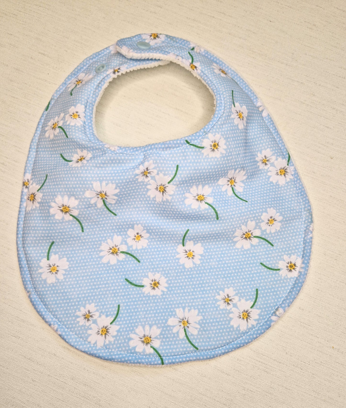 Blue daisy dribble bib