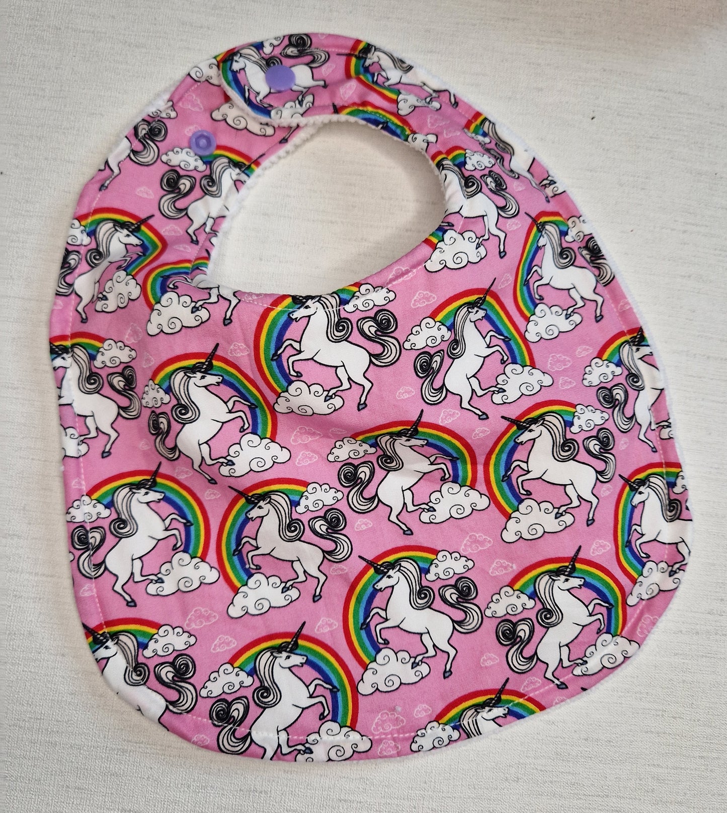 Pink unicorn dribble bib