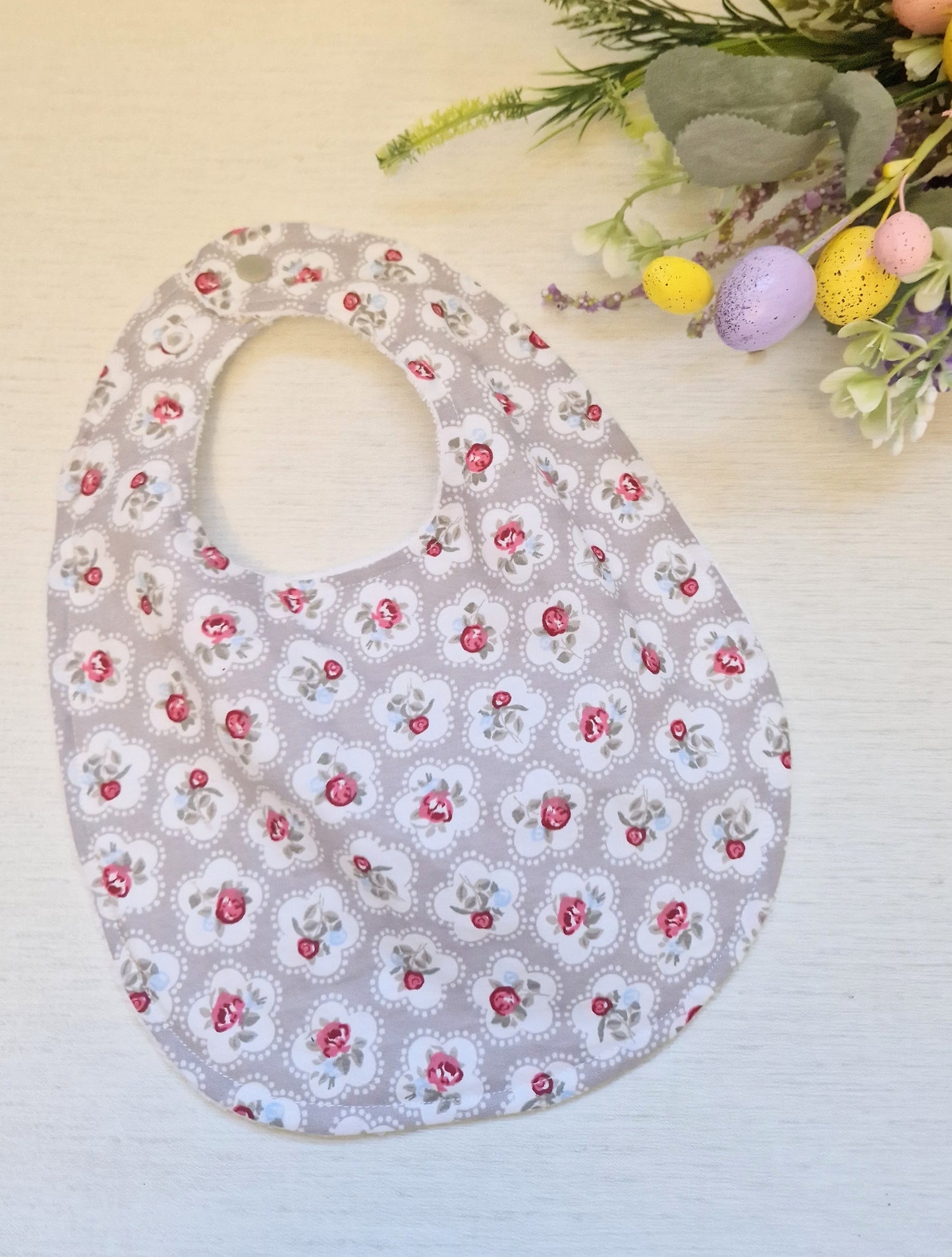 Beige floral Bib