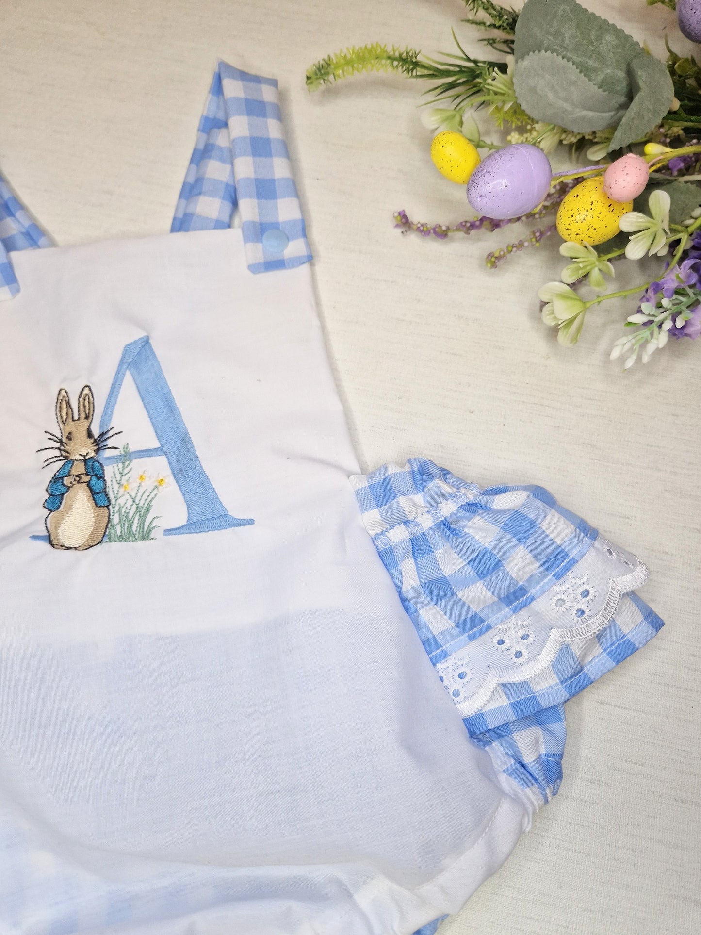Blue peter initial rabbit frilly romper