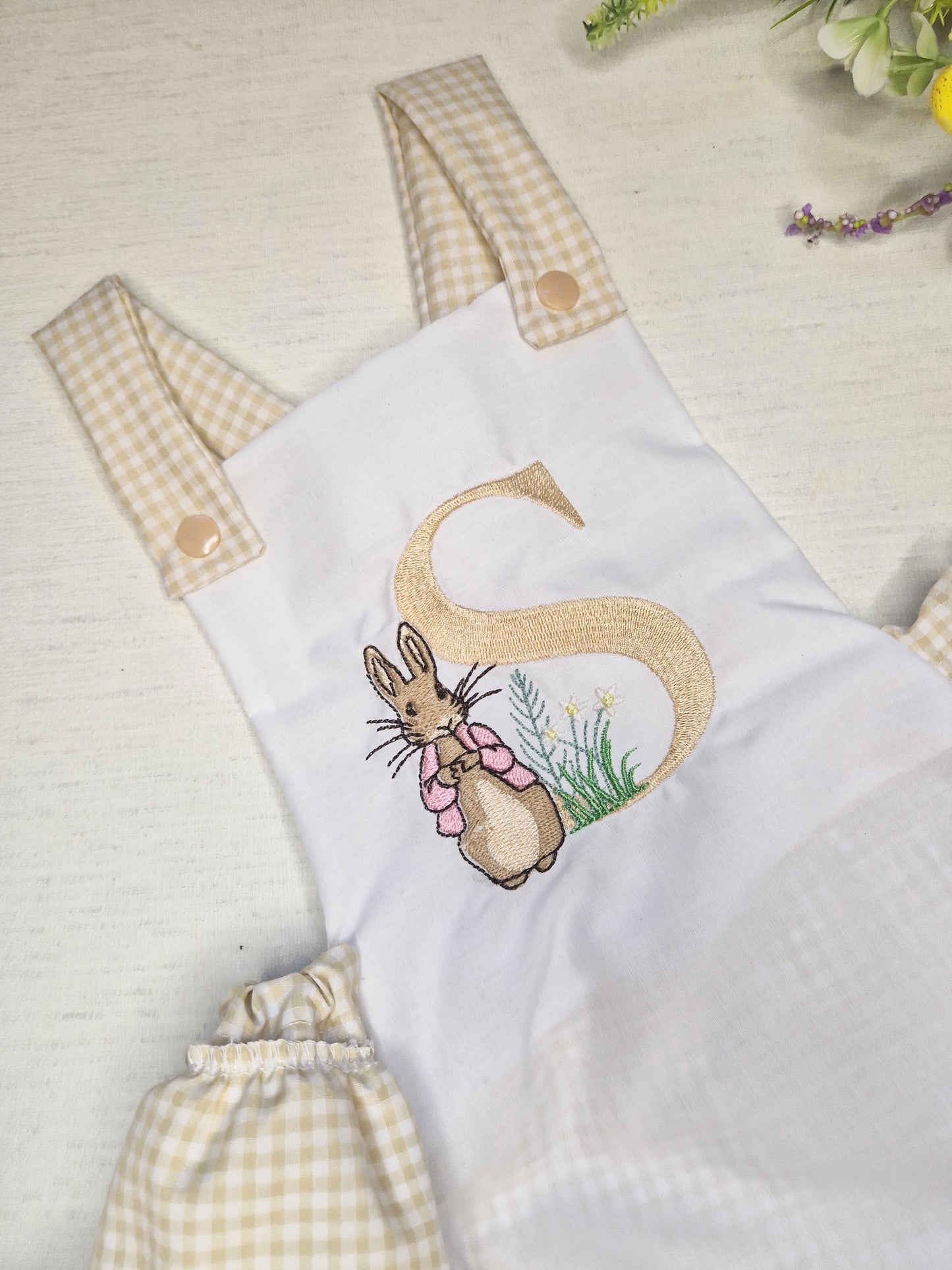 Beige peter initial rabbit frilly romper