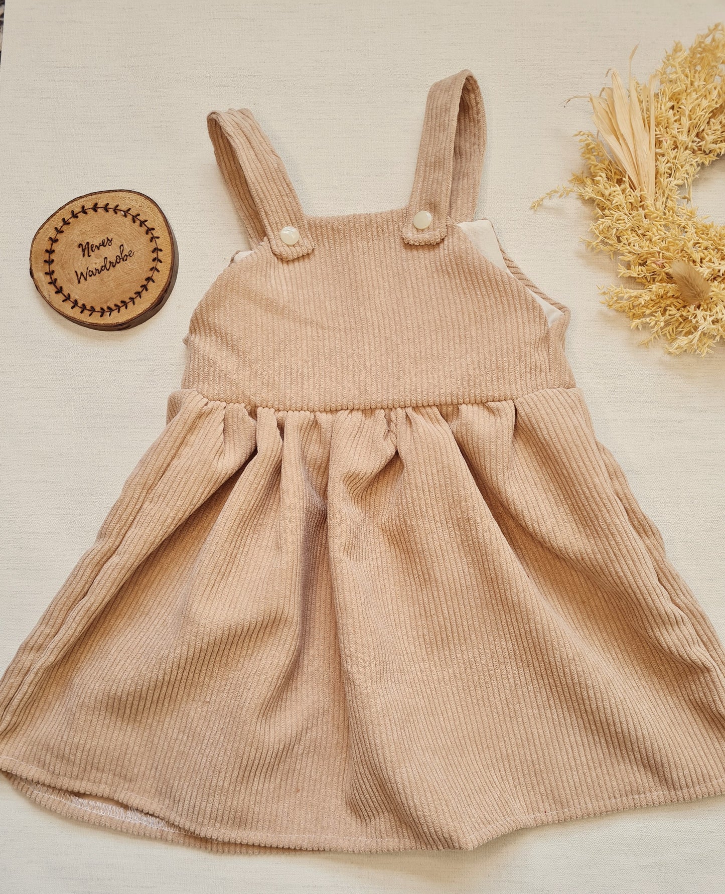 Nude corduroy dungaree dress