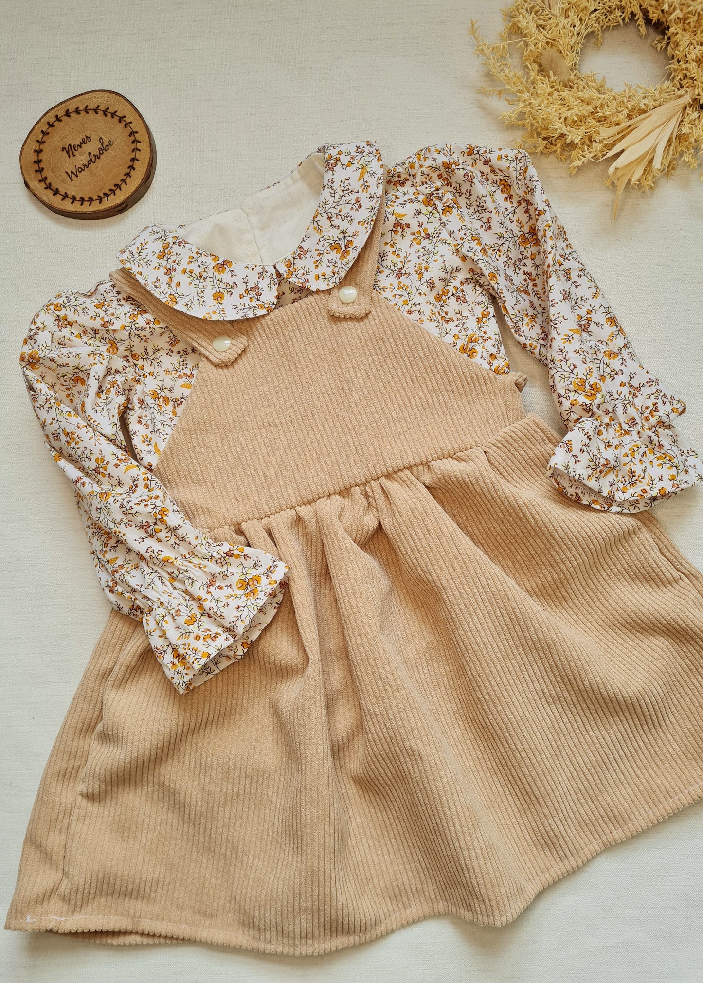 Nude corduroy dungaree dress